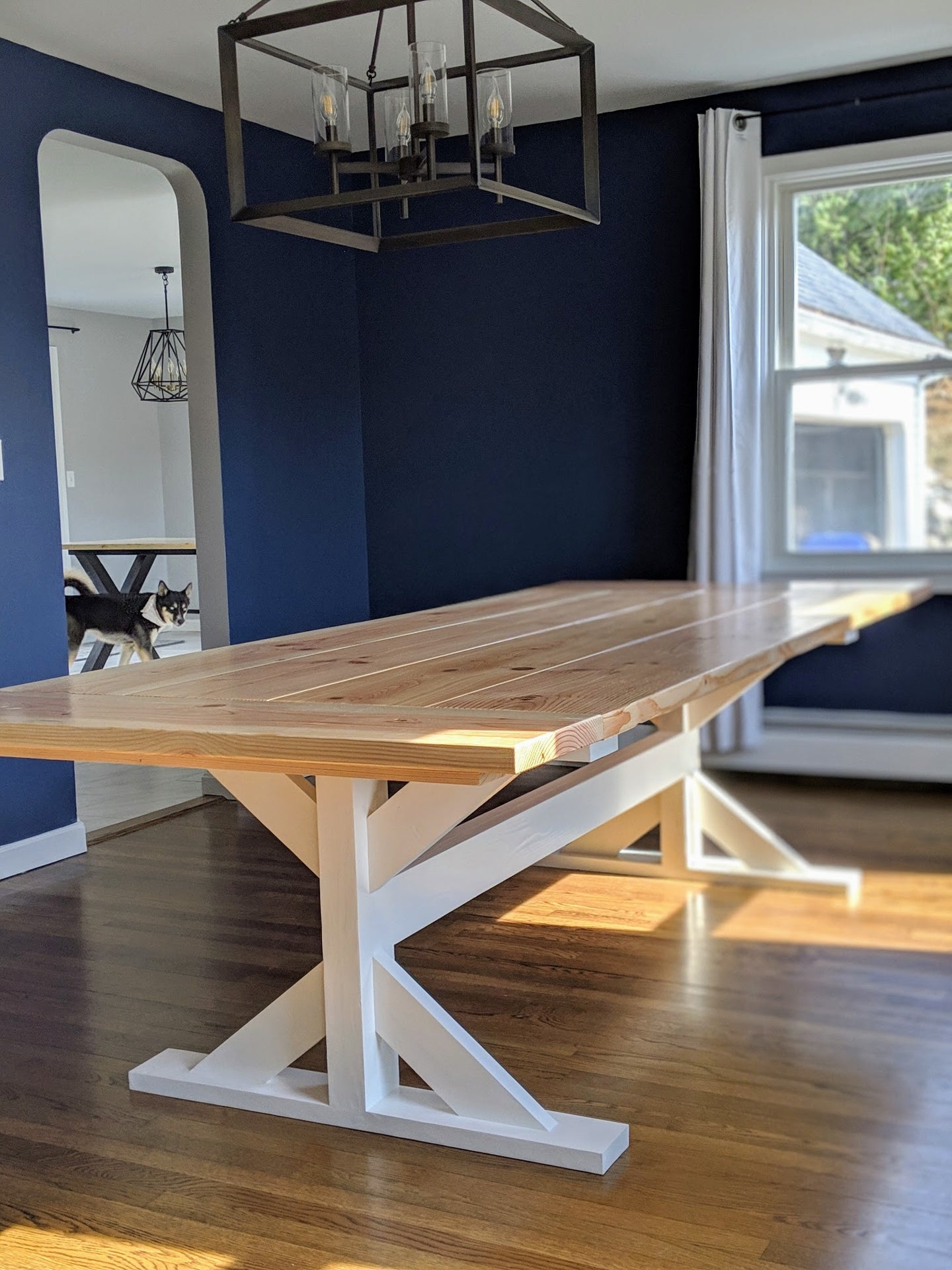 Custom dining table created with wood and metal base.  Custom built furniture designed to exactly what the client desires.  Handcrafted by one craftsman from design to delivery to build your custom furniture in Groton, MA.  Custom farmhouse dining table.
